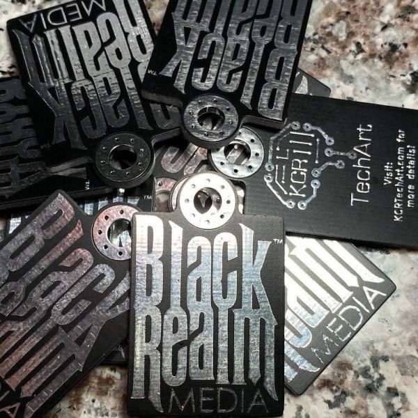 Black realm media keychains