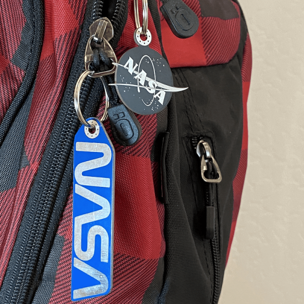 HD NASA keychains on backpack